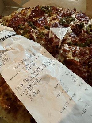 This is my receipt for my pizza and the pizza I got.