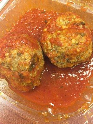 Homemade meatballs in  homemade sauce.