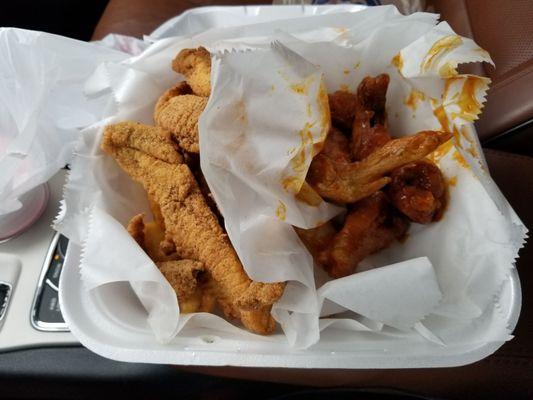 Honey hot wings , catfish, and fries