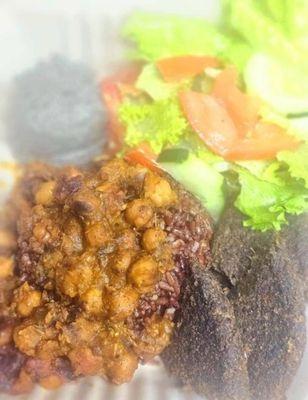 Meal plate; red wild rice, garbanzo beans, veggie patty, hummus, side salad.