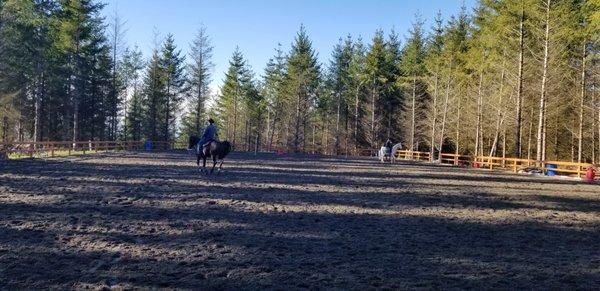 Riders enjoying the all-weather, 100 x 200 foot arena.