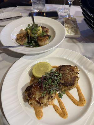 Scallops with wilted garlic spinach and crab cakes