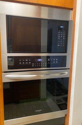 New fabricated stainless steel trim piece above wall oven