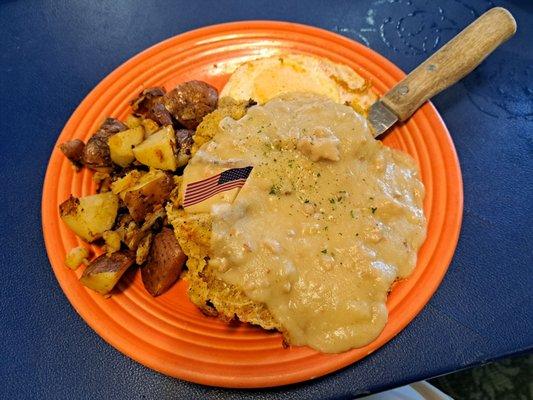 Country fried steak, country potatoes, eggs