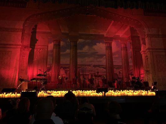 The stage at the Scottish Rite Theater illuminated in red, amid candlelight :) !