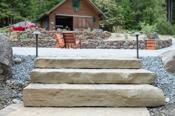 Natural stone stairs, pavers, fire pit and retaining wall in Jenner CA