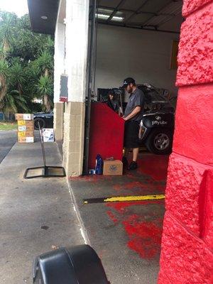 4840 Golden Gate Blvd. Jiffy Lube.  Hard working young men on a hot day.