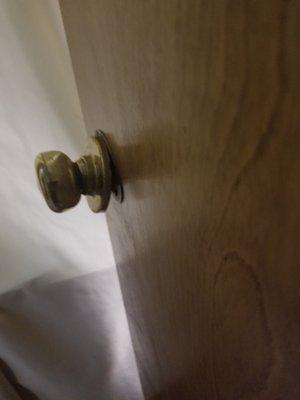 Broken door knob but in a healthcare facility I would expect lever handles.