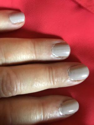 Painted cuticles 
 
 Then - the elevated polish as a few days went by cracked off like glass chips leaving the nails extremely messy looking