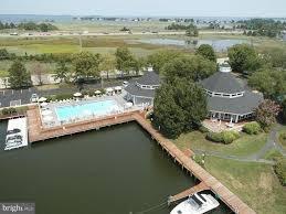 Oyster Cove pool, Clubhouse, and guest boat slips