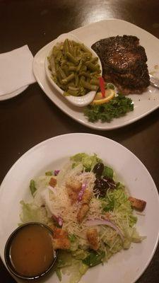 Ribeye with green beans and a salad.