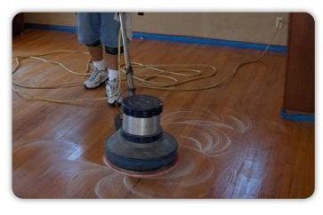 One of our techs doing a Wood Floor Cleaning & Refinishing.