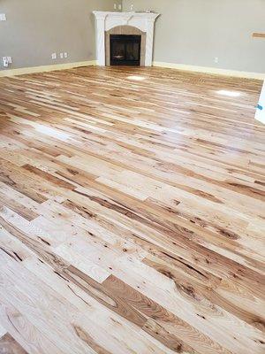 Love the natural look of Hickory? Check out this Hickory Floor finished with Rubio Monocoat Pure Oil Plus2C by Colpron Custom Floors LLC.