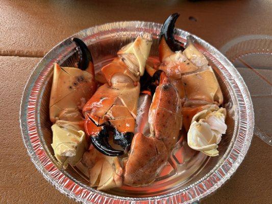 4 jumbo stone crab claws - 1.77 lb @ $55.99/lb ($99.10)