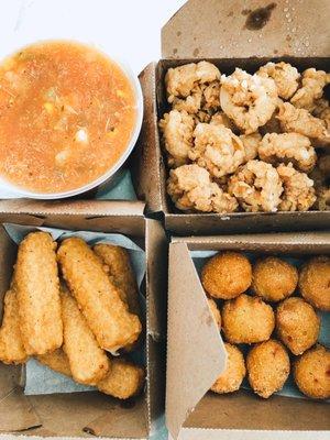 Crab Bisque, Fried Mozzarella Cheese, Crispy Calamari, and Hush Puppies.