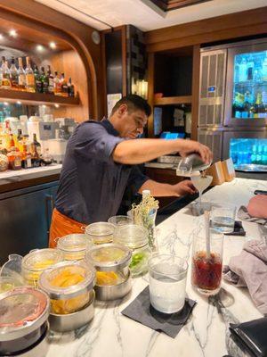 The best bartender readying a house made martini