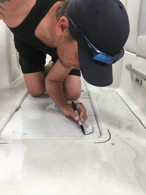 Adding custom marine flooring to this boat.