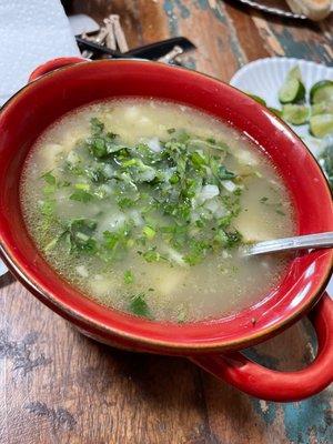 White Menudo with cilantro and onions and lime.