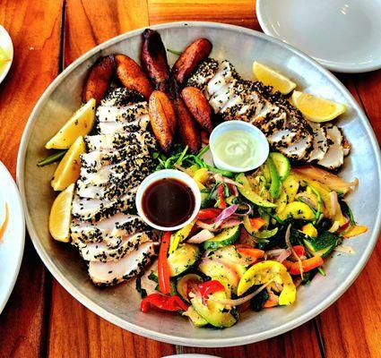 Fresh caught Wahoo with plantains and steamed veggies. I know because we caught it.