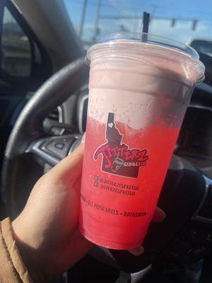 Pink lemonade zip fizz with strawberry flavoring and strawberry cold foam