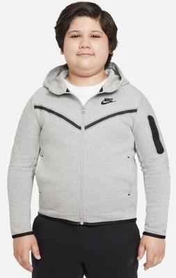 Child with Nike sweater on