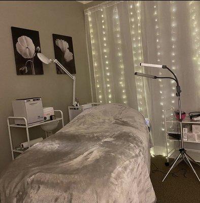 Comfy spa bed so you can come in and relax underneath the beautiful twinkle lights