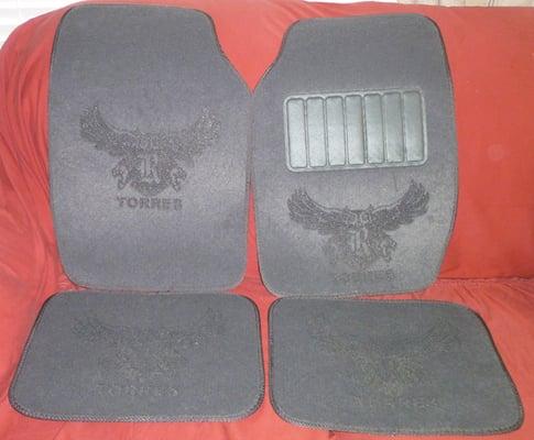 Vehicle floormats with logos.