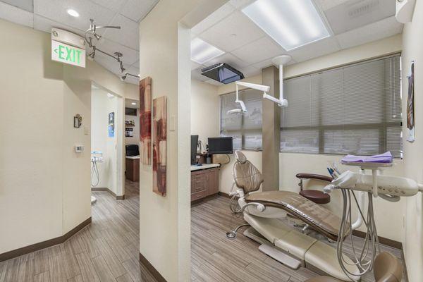 Hygiene operatory with a dental chair and various tools at StarBrite Dental in Fremont, CA