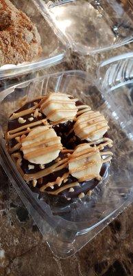 Funky monkey.  Chocolate dipped, banana slices, peanut butter drizzle