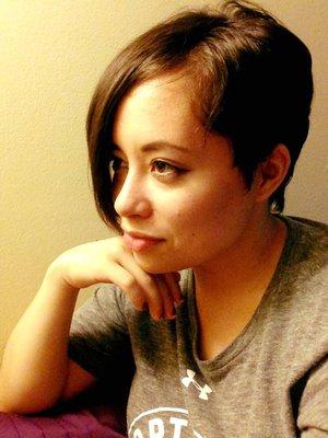 Short pixie with long side bangs