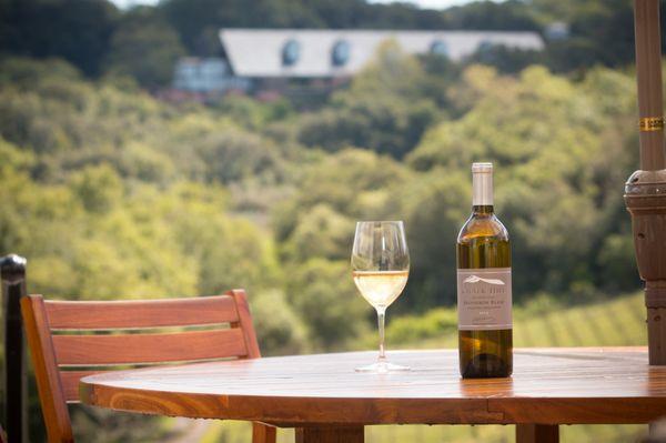 Enjoy incredible views from the outdoor space of Chalk Hill Estate while enjoying wine