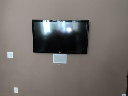 50" flat screen TV with in-wall speaker