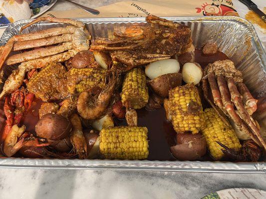 Create Your Own; Cajun: Snow Crab, Shrimp, Crawfish, and Sausage with extra corn & potato - Delicious!!