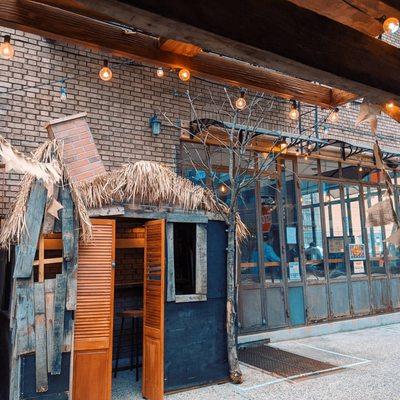 Small booths outside for couple dining.