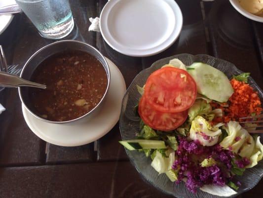 Salad with a huge bowl of dressing