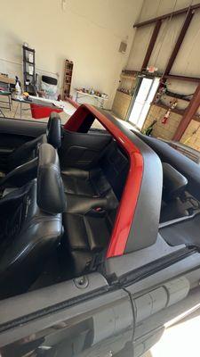 Paint match red vinyl wrap for a Convertable Mustang