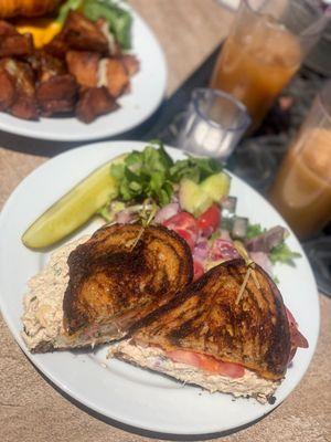 Tuna melt with a fresh salad & breakfast sandwich.