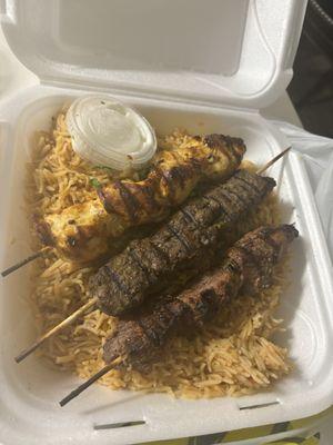 Beef kebab, chicken kebab and lamb kebab with Afghan Rice.