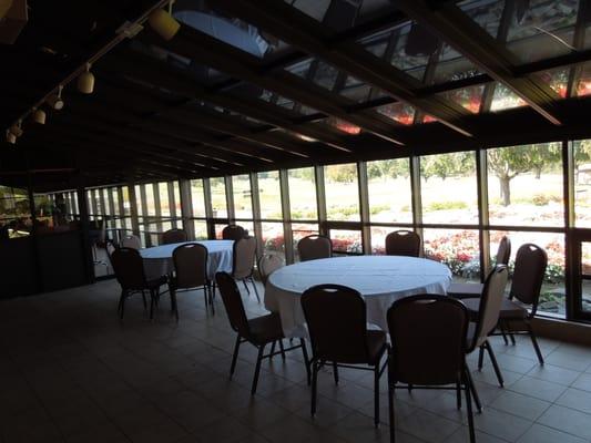 tables overlooking the course