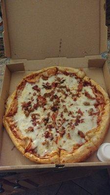 Large super meat pizza