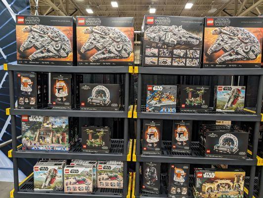 Overpriced Lego items on the shelf at the event