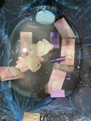 Empty packets thrown into pedi tub.