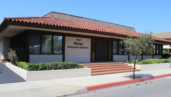 The front of the Metro Insurance Services building on Irvine Blvd. Parking lot and main lobby entrance is in the rear / parking lot.