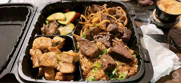 Steak & Chicken Combo with Fried Rice, Noodles, Veggies & side of sauce (not sure which sauce)