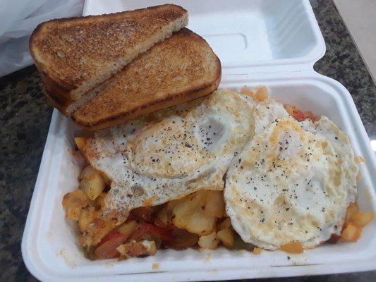 Two eggs, American fries, toast