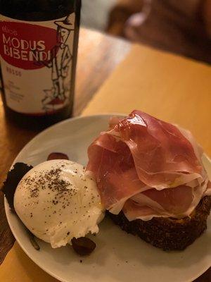 Burrata "black truffle" with Prosciutto Parma 24 Months and home made bread paired with natural wine.