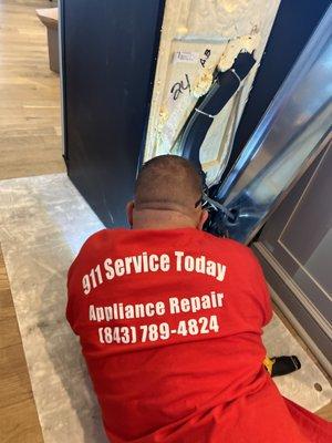 911 Service tech on the job helping costumers