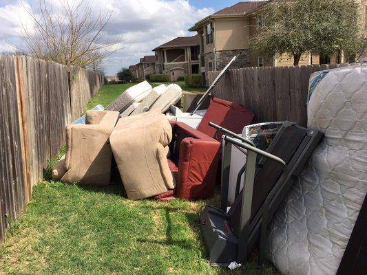 Abandoned furniture that sat around the garbage cans for almost two weeks. This definitely discouraged us from having guests over.