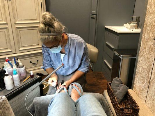 At work on a pedicure