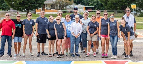 Independent fiduciary Financial Planning firm Strategic Wealth Designers volunteering at partner school Atkinson Elementary in Louisville